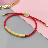 Gold Engraved Plate + Red Rope